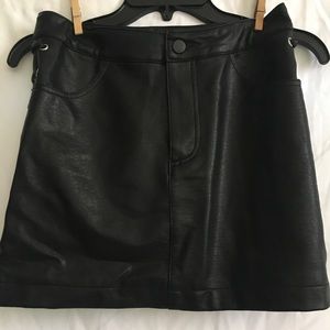 Black leather mini skirt